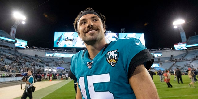 Jacksonville Jaguars quarterback Gardner Minshew (15) walks off the field after defeating the Tennessee Titans at TIAA Bank Field. (Douglas DeFelice-USA TODAY Sports)