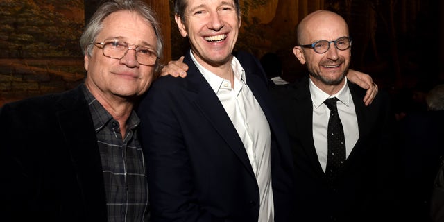 Attending the after-party for the premiere of Sony Pictures Releasing's "Resident Evil: The Final Chapter," are, from left, Clint Culpepper, president, Screen Gems; writer/director Paul W.S. Anderson and producer Jeremy Bolt. The event was held at Clifton's Cafeteria in Los Angeles, Jan. 23, 2017. (Getty Images)