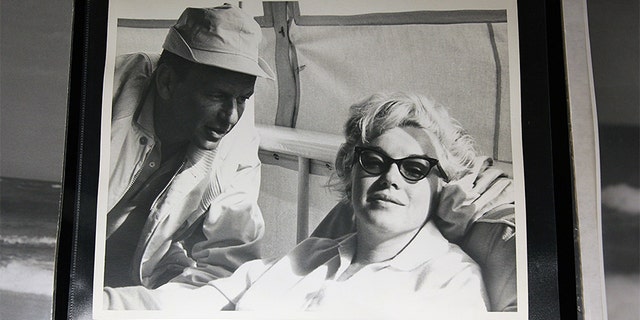 Auction item photograph of Marilyn Monroe (R) and Frank Sinatra is displayed at Bonhams and Butterfields on June 12, 2009, in Los Angeles, California.