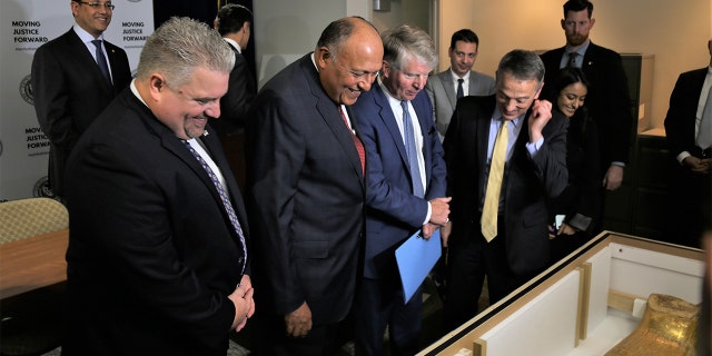 The Gold Coffin of Nedjemankh was presented to the Egyptian Minister of Foreign Affairs Sameh Hassan Shoukry, who accepted the piece on behalf of the people of Egypt. (ICE)