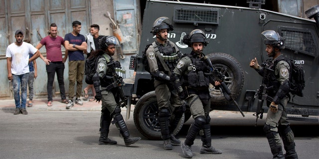Israeli border police officers in the village of Azzun near the West Bank city of Qalqilya on Saturday.