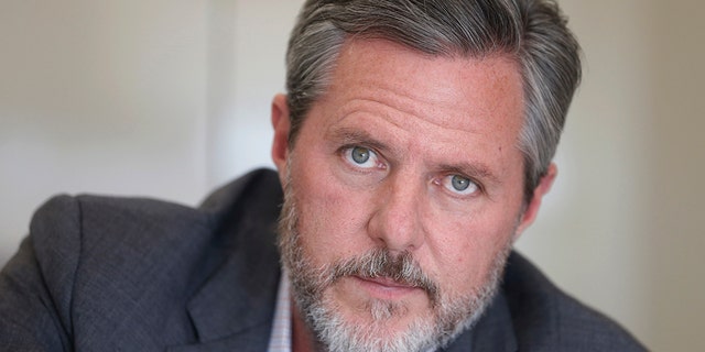 Former Liberty University president Jerry Falwell Jr., poses during an interview in his offices at the school in Lynchburg, Va on Nov. 16, 2016. (AP Photo/Steve Helber, File)