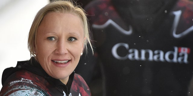 Canadian bobsledder Kaillie Humphries celebrates after her victory in the 2-person bobsleigh category at the world cup at the DKB ice track in Altenberg, Germany.