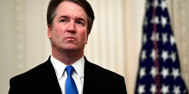 In this Oct. 8, 2018, file photo, Supreme Court Justice Brett Kavanaugh stands before a ceremonial swearing-in in the East Room of the White House in Washington. (AP Photo/Susan Walsh, File)