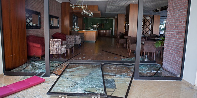 Sept. 12, 2019: Shattered glass doors at the Acapulco hotel in Kyrenia (Girne) in the self-proclaimed Turkish Republic of Northern Cyprus (TRNC) north of the divided Cypriot capital Nicosia, after the building was damaged when a military depot exploded nearby. -