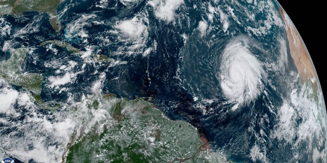 Hurricane Lorenzo can be seen swirling in the eastern Atlantic on Thursday, the day the ship reported problems.