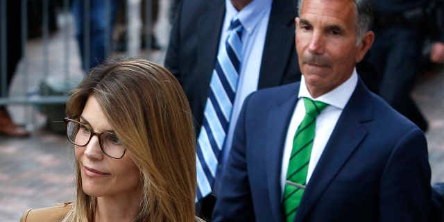 Actress Lori Loughlin and her husband, Mossimo Giannulli, are reportedly struggling after new charges were brought against them in the college admissions scandal.