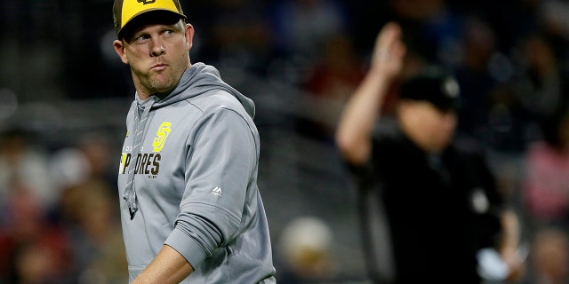San Diego Padres manager Andy Green walks off the field during the eighth inning of the team's baseball game against the Arizona Diamondbacks in San Diego, Friday, Sept. 20, 2019. (AP Photo/Alex Gallardo)