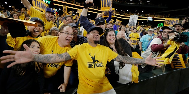 Seattle Mariners starting pitcher Felix Hernandez poses for photos with fans following the team's baseball game against the Oakland Athletics, Thursday, Sept. 26, 2019, in Seattle. The Athletics won 3-1. (AP Photo/Ted S. Warren)