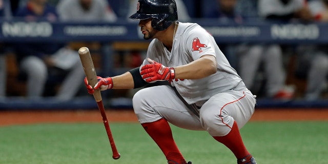 Boston Red Sox's Xander Bogaerts reacts after being called out on strikes on a pitch by Tampa Bay Rays relief pitcher Colin Poche to end a baseball game Monday, Sept. 23, 2019, in St. Petersburg, Fla. (AP Photo/Chris O'Meara)