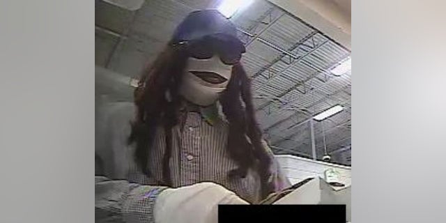 Authorities said a bank robber dubbed the "Mummy Marauder" because of this white gauze covering his face robbed a Houston-area bank on Friday, Sept. 13.