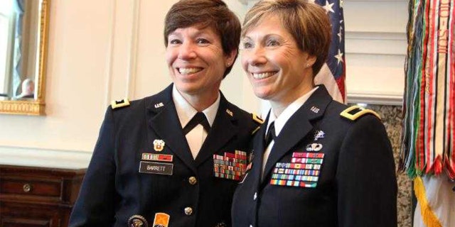 Maj. Gen. Maria Barrett poses with Brig. Gen. Paula Lodi during then Col. Lodi's promotion ceremony at the Army Navy Country Club in Arlington, VA on 12 July 2019.