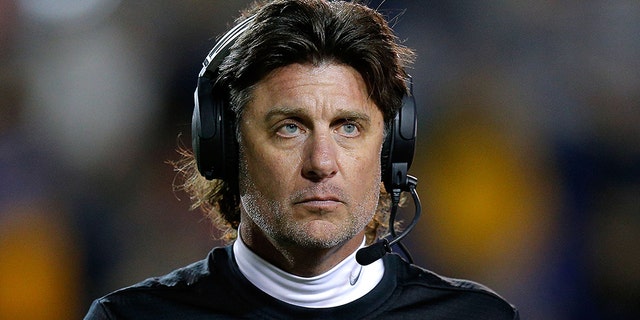 Mike Gundy coaches OK State. (Photo by Jonathan Bachman/Getty Images)