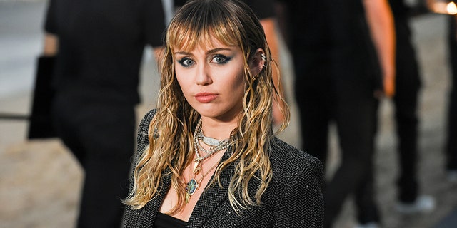 Miley Cyrus at Saint Laurent men's spring-summer 20 show on June 6, 2019 in Malibu, Calif.