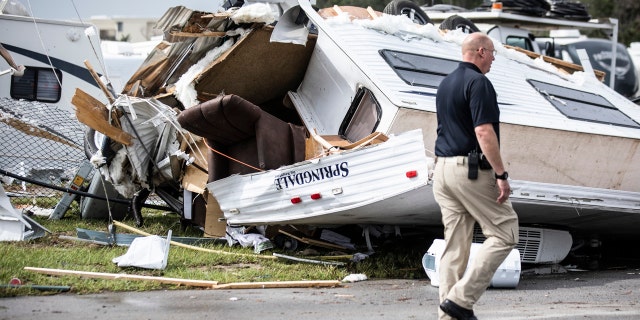 Tornadoes hit Carolinas as Hurricane Dorian floods Charleston; 200K without power 6 Bill Bailey, assistant chief of the Emerald Isle Police Department, walks past a damaged trailer in the Holiday Trav-l Park on Thursday, Sept. 5, 2019, in Emerald Isle, N.C, after a possible tornado generated by Hurricane Dorian struck the area.