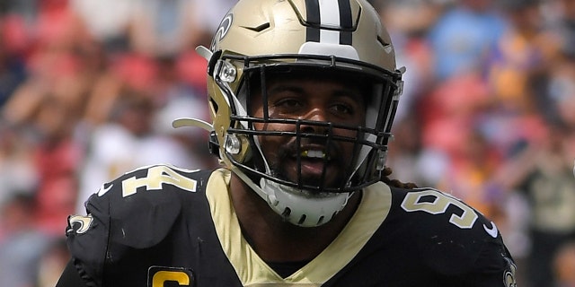 New Orleans Saints defensive end Cameron Jordan, right, celebrates after sacking Los Angeles Rams quarterback Jared Goff during the first half of an NFL football game Sunday, Sept. 15, 2019, in Los Angeles. (AP Photo/Mark J. Terrill)