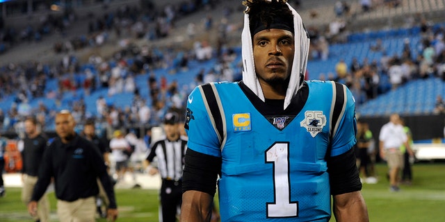Carolina Panthers quarterback Cam Newton (1) walks off the field following the Panthers 20-14 loss to the Tampa Bay Buccaneers following an NFL football game in Charlotte, N.C., Friday, Sept. 13, 2019. (AP Photo/Mike McCarn)