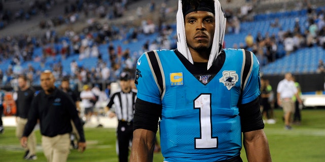 Carolina Panthers quarterback Cam Newton (1) walks off the field following the Panthers 20-14 loss to the Tampa Bay Buccaneers following an NFL football game in Charlotte, N.C., Friday, Sept. 13, 2019. (AP Photo/Mike McCarn)