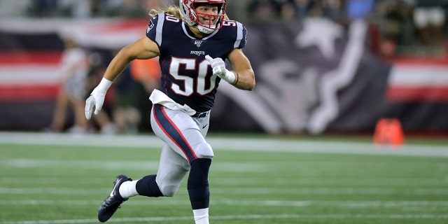 New England Patriots defensive end Chase Winovich runs down the field in the first quarter of an NFL preseason football game against the Carolina Panthers, Thursday, Aug. 22, 2019, in Foxborough, Mass. (AP Photo/Charles Krupa)