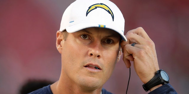 Los Angeles Chargers quarterback Philip Rivers watches from the sidelines during the first half of the Chargers' preseason NFL football game against the San Francisco 49ers in Santa Clara, Calif., Thursday, May 29. August 2019.
