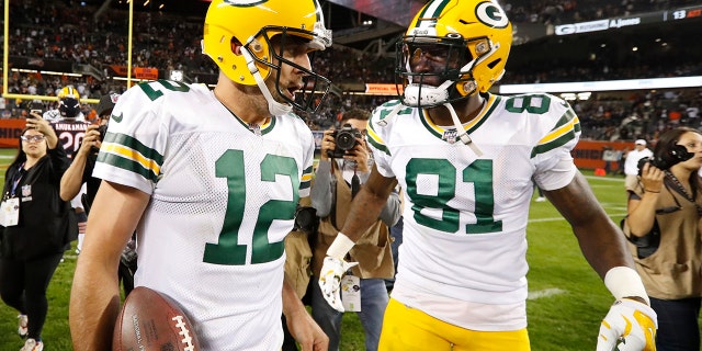 Green Bay Packers' Aaron Rodgers celebrates with Geronimo Allison (81) after an NFL football game against the Chicago Bears Thursday, Sept. 5, 2019, in Chicago. The Packers won 10-3. (AP Photo/Morry Gash)