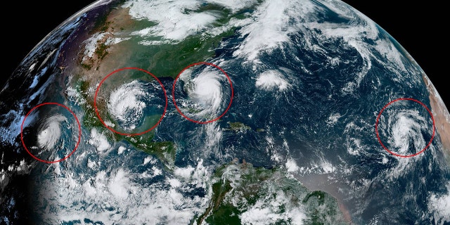 This image, taken on Tuesday, Sept. 3, 2019, shows tropical activity in the Pacific and Atlantic Oceans. Hurricane Juliette can be seen to the left far southwest off Mexico. A new system can be seen in between Juliette and Hurricane Dorian, currently swirling off Florida.