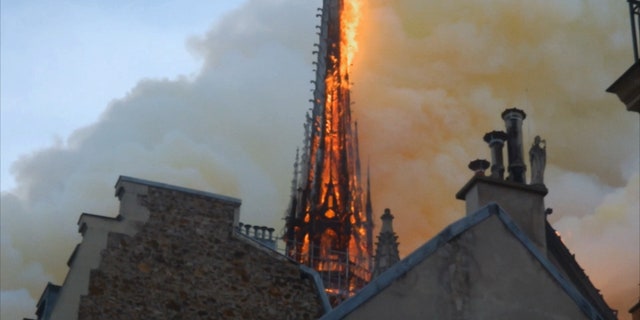 Notre Dame's famous spire before it toppled in the fire. (Science Channel)