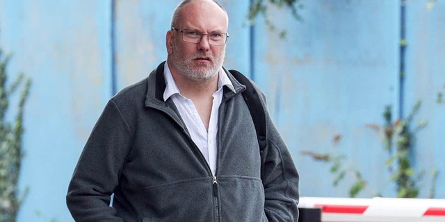 Peter Hartley, 50, arrives at Aylesbury Crown Court, Friday, September 6, 2019 where he was jailed for 16 months after planting a spy camera in the ladies' toilets of Pinewood Studios, where the latest James Bond is being filmed. Andrew Matthews/PA Wire/ Press Association via AP Images