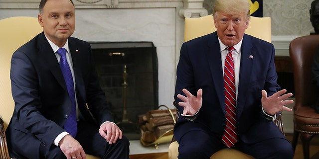 U.S. President Trump speaks while meeting with Poland's President Andrzej Duda in the Oval Office of the White House in Washington, U.S., June 12, 2019. REUTERS/Leah Millis