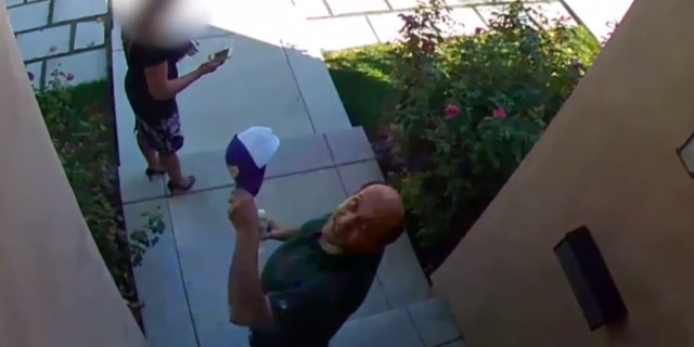 The man glanced at the camera multiple times before attacking the real estate agent on Sunday.