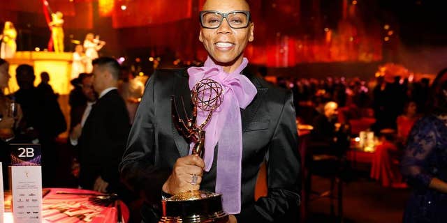 RuPaul poses with his award for outstanding host for a reality or competition program for "RuPaul's Drag Race" at the Governors Ball during Night 1 of the Television Academy's 2019 Creative Arts Emmy Awards on Sept. 14.