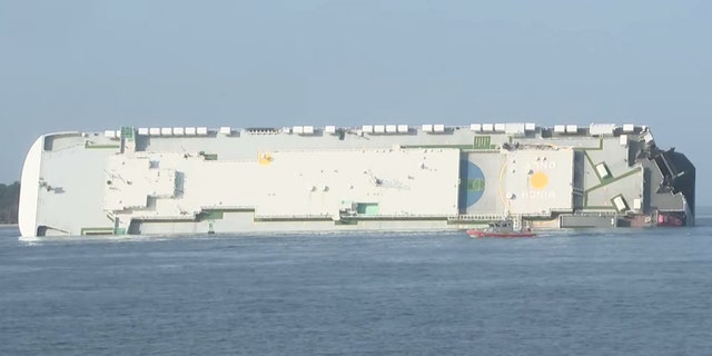 The cargo ship can be seen on it's side near St. Simmons Sound, Ga.