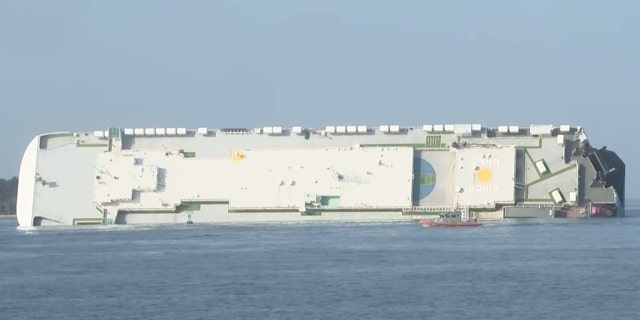 The cargo ship can be seen on it's side near St. Simmons Sound, Ga.
