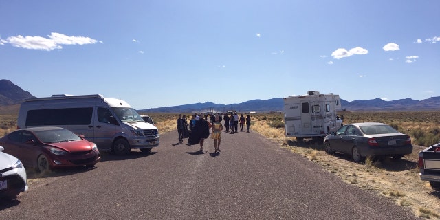 Crowds gathering outside the back gate to Area 51 in Rachel, Nev.