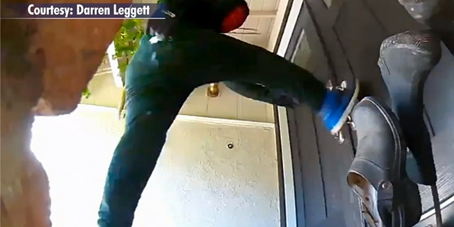 Surveillance video captured two masked men kicking in the front door of a California house, then taking off when they realized someone was inside the home.