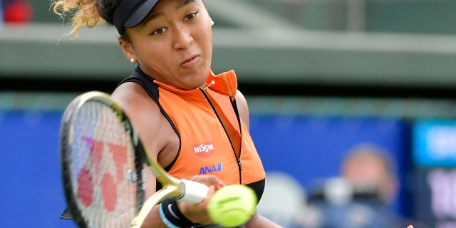 Japan's Naomi Osaka makes a forehand return to Russia's Anastasia Pavlyuchenkova during their final match at the Toray Pan Pacific Open tennis tournament in Osaka, western Japan, Sunday, Sept. 22, 2019. Osaka won her first singles title since the Australian Open in January by beating Pavlyuchenkova 6-2, 6-3 in the final. (Kyodo News via AP)