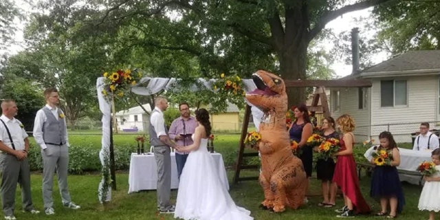 “It was hot!” Meador said of wearing full-body costume to the outdoor August nuptials.