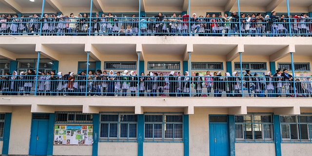 A new report accuses UNRWA - a UN agency that educates Palestinian students - of employing some teachers who promote terrorism against Jews. (Photo by MAHMUD HAMS / AFP)        