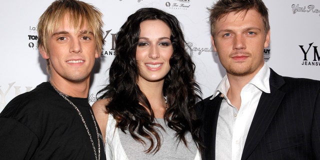 Aaron Carter stands with his siblings, Angel Carter and Nick Carter. Aaron, 32, has sparked debate with siblings over social media in recent months. In September, Nick, 39, requested a restraining order against the 