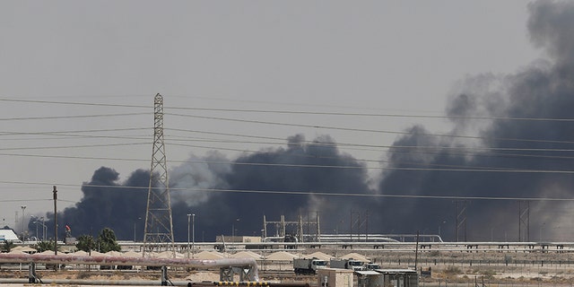 Smoke is seen following a fire at Aramco facility in the eastern city of Abqaiq, Saudi Arabia, September 14, 2019. 