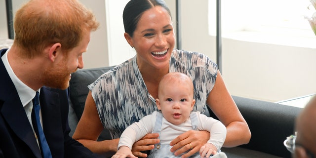 (L-R) Prince Harry, Duke of Sussex, Meghan, Duchess of Sussex, and their baby son Archie Mountbatten-Windsor in September 2019.
