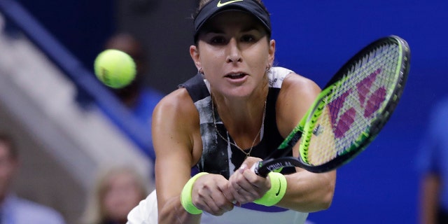 Belinda Bencic, of Switzerland, returns to Naomi Osaka, of Japan, during the fourth round of the US Open tennis championships. (AP Photo/Frank Franklin II)