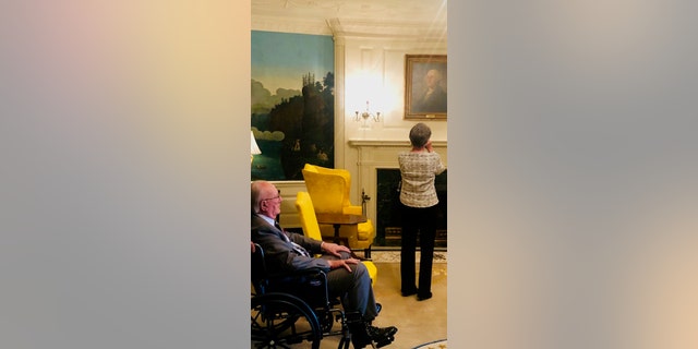 Bob Cousy with one of his daughters in the White House.