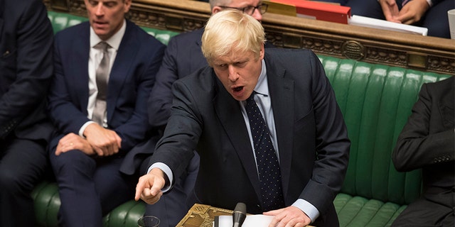Britain's Prime Minister Boris Johnson speaking in the House of Commons in London after MPs voted in favor of allowing a cross-party alliance to take control of the Commons agenda on Wednesday in a bid to block a no-deal Brexit on October 31.
