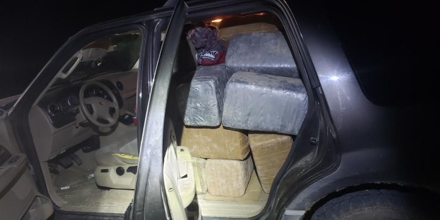 The driver abandoned the vehicle with 1,127 pounds of marijuana, but left his wallet and ID card inside, police said.