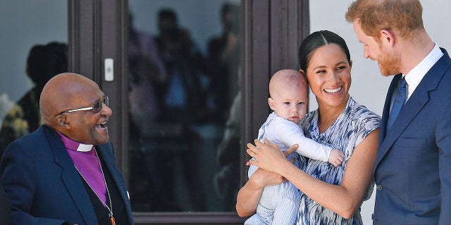 Britain's Duke and Duchess of Sussex, Prince Harry and his wife Meghan Markle hold their baby son Archie as they meet with Archbishop Desmond Tutu at the Tutu Legacy Foundation in Cape Town on Sep. 25, 2019. The British royal couple is on a 10-day tour of southern Africa -- their first official visit as a family since their son Archie was born in May.