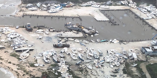 Coast Guard Air Station Clearwater forward-deployed four MH-60 Jayhawk helicopter crews in support of search and rescue and humanitarian aid in the Bahamas, Sept. 2, 2019.