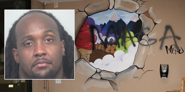 Mugshot for Edawn Coughtman, 31 years old. Officers saw swastikas and MAGA scribbling on the walls and kiosks of the damaged pizza and ice cream shop in Coughman, near Atlanta.