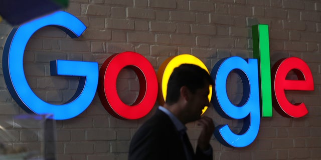 An illuminated Google Inc. logo sits on display at the company's exhibition stand during the Noah Technology Conference in Berlin, Germany, on Thursday, June 13, 2019. (Credit: Krisztian Bocsi/Bloomberg via Getty Images)