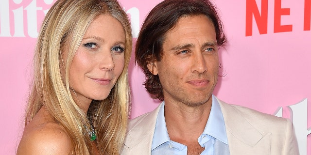 Gwyneth Paltrow and her husband Brad Falchuk arrive for the Netflix premiere of